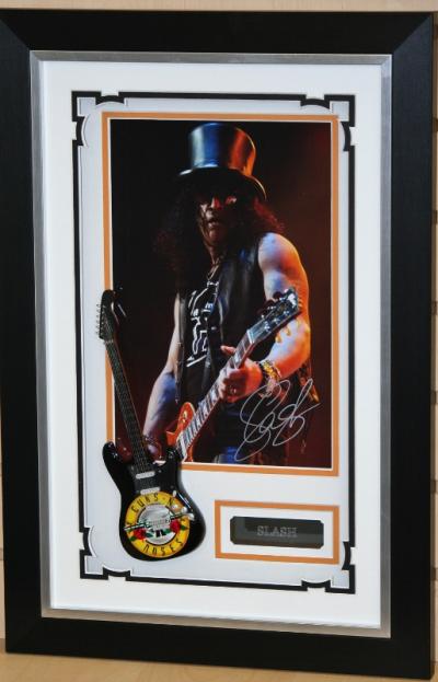 Slash signed with mini guitar!!