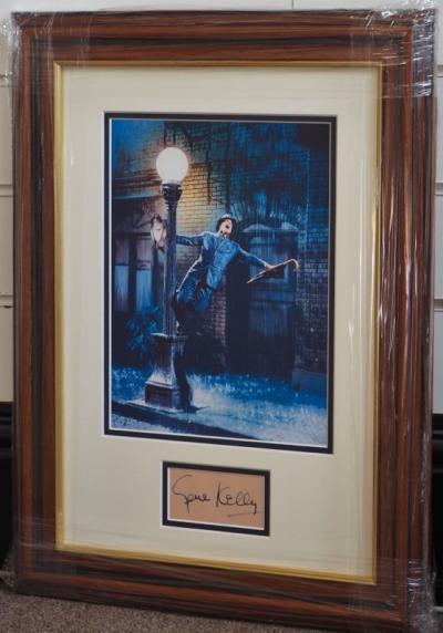 Gene Kelly signed album page