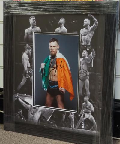 Conor McGregor signed 12 x 8