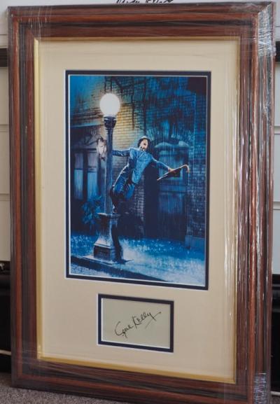 Gene Kelly signed album page