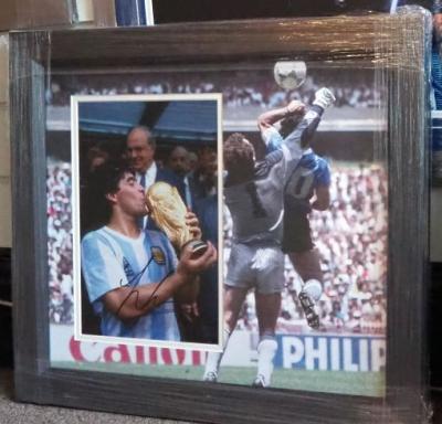 Diego Maradona signed 12 x 8