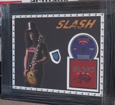 Slash hand signed CD