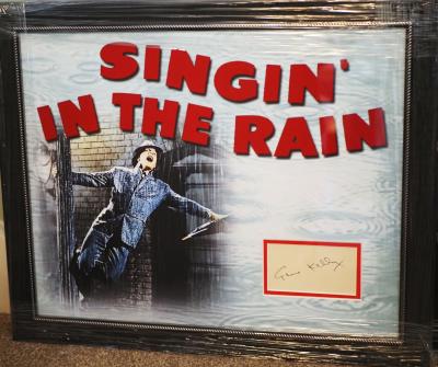 Gene Kelly signed album page